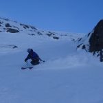 Skiing the couloirs below Col de Rachasses