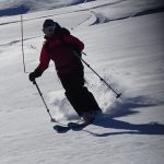 Carolyn skiing powder at Le Tour