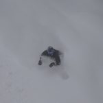 Snowboarder in deep snow