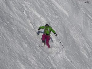 Practicing steep turns in powder snow