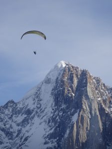Paraglider in front of the Aiguille Vert