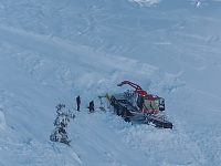 Piste basher being rescued